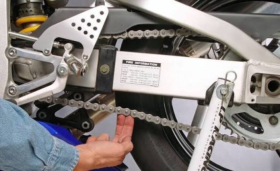 how to tighten motorcycle chain